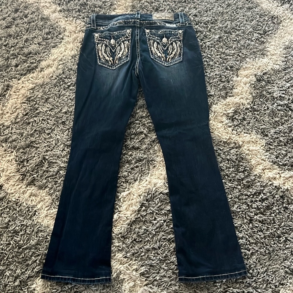 Size 27 buckle jeans